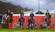 11 August 2018; Michael Pender of Ireland competing on Hearton Du Bois H, left, Richard Howley of Ireland competing on CMS Tallulah, second from left, Padraic Judge of Ireland competing on CITI Business, second from right, and Pedro Junqueira Muylaert of Brazil competing on Chacote after winning the Land Rover Puissance during the StenaLine Dublin Horse Show at the RDS Arena in Dublin. Photo by Harry Murphy/Sportsfile