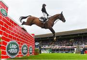 11 August 2018; Michael Pender of Ireland competing on Hearton Du Bois H during the Land Rover Puissance during the StenaLine Dublin Horse Show at the RDS Arena in Dublin. Photo by Harry Murphy/Sportsfile