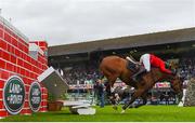 11 August 2018; Barbara Schnieper of Switzerland competing on Dickens II during the Land Rover Puissance during the StenaLine Dublin Horse Show at the RDS Arena in Dublin. Photo by Harry Murphy/Sportsfile