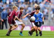 11 August 2018; Joey Dalton, Borris NS, Borris, Carlow, representing Dublin, in action against Jeffrey Oates, St. Michael’s & St. Patrick’s NS, Boyle, Roscommon, representing Galway, during the INTO Cumann na mBunscol GAA Respect Exhibition Go Games at the GAA Football All-Ireland Senior Championship Semi Final match between Dublin and Galway at Croke Park in Dublin.  Photo by Brendan Moran/Sportsfile