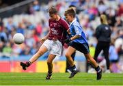 11 August 2018; Cahal McKaigue, St. Patricks PS Glen, Maghera, Derry, representing Galway, in action against Mattie McDermott, St Paul’s PS, Irvinestown, Fermanagh, representing Dublin, during the INTO Cumann na mBunscol GAA Respect Exhibition Go Games at the GAA Football All-Ireland Senior Championship Semi Final match between Dublin and Galway at Croke Park in Dublin.  Photo by Brendan Moran/Sportsfile