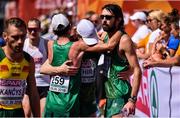 12 August 2018; Ireland athletes, from left, Kevin Seaward, Sean Hehir and Mick Clohisey after competing in the Men's Marathon event during Day 6 of the 2018 European Athletics Championships in Berlin, Germany. Photo by Sam Barnes/Sportsfile