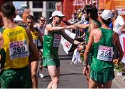 12 August 2018; Ireland athletes, from left, Sean Hehir, Mick Clohisey and Kevin Seaward after competing in the Men's Marathon event during Day 6 of the 2018 European Athletics Championships in Berlin, Germany. Photo by Sam Barnes/Sportsfile