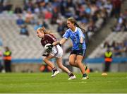 11 August 2018; Lucy Shanahan, Clohanes NS, Clohanes, Clare, representing Galway, in action against Ana Dragusin, Scoil Mhuire na nÁird, Shillelagh, Wicklow, representing Dublin, during the INTO Cumann na mBunscol GAA Respect Exhibition Go Games at the GAA Football All-Ireland Senior Championship Semi Final match between Dublin and Galway at Croke Park in Dublin. Photo by Ray McManus/Sportsfile