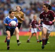 11 August 2018; Saoirse Martin, St Mary’s PS, Newtownbutler, Fermanagh, representing Dublin, in action against Muireann Rahilly, Scartaglen NS, Killarney, Kerry, representing Galway, during the INTO Cumann na mBunscol GAA Respect Exhibition Go Games at the GAA Football All-Ireland Senior Championship Semi Final match between Dublin and Galway at Croke Park in Dublin. Photo by Ray McManus/Sportsfile