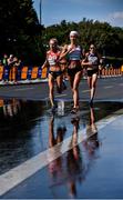 12 August 2018; Volha Mazuronak of Belarus, centre, on her way to winning the Women's Marathon event, ahead of Eva Vrabcová-Nývltová of Czech Republic, left, who finished third, and Clémence Calvin of France, right, who finished second, during Day 6 of the 2018 European Athletics Championships in Berlin, Germany. Photo by Sam Barnes/Sportsfile