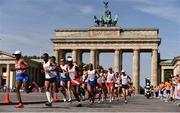 12 August 2018; Competitors pass the Brandenburg gate during the Men's Marathon event during Day 6 of the 2018 European Athletics Championships in Berlin, Germany. Photo by Sam Barnes/Sportsfile