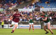 12 August 2018; Róisín Leonard of Galway scores her side's third goal despite the efforts of Rebecca O'Malley of Mayo during the TG4 All-Ireland Ladies Football Senior Championship quarter-final match between Galway and Mayo at Dr. Hyde Park, in Roscommon. Photo by Eóin Noonan/Sportsfile