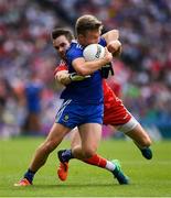 12 August 2018; Conor McCarthy of Monaghan is tackled by the Tyrone full back Ronan McNamee during the GAA Football All-Ireland Senior Championship semi-final match between Monaghan and Tyrone at Croke Park in Dublin. Photo by Ray McManus/Sportsfile