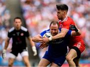12 August 2018; Vinny Corey of Monaghan in action against Mattie Donnelly of Tyrone during the GAA Football All-Ireland Senior Championship semi-final match between Monaghan and Tyrone at Croke Park in Dublin. Photo by Stephen McCarthy/Sportsfile