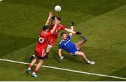 12 August 2018; Kieran Hughes of Monaghan scores a point despite the efforts of Matthew Donnelly, left, and Rory Brennan of Tyrone during the GAA Football All-Ireland Senior Championship Semi-Final match between Monaghan and Tyrone at Croke Park, in Dublin. Photo by Daire Brennan/Sportsfile