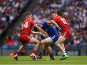12 August 2018; Darren Hughes of Monaghan is tackled by Tyrone players Kieran McGeary, left, and Cathal McShane during the GAA Football All-Ireland Senior Championship semi-final match between Monaghan and Tyrone at Croke Park in Dublin. Photo by Ray McManus/Sportsfile