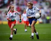 12 August 2018; Maeve Heenan, Kilbeheeny NS, Mitchelstown, Co Cork, representing Monaghan, and Katie Havern, Ballyholland PS, Newry, Co Down, representing Tyrone, during the INTO Cumann na mBunscol GAA Respect Exhibition Go Games at the GAA Football All-Ireland Senior Championship Semi Final match between Monaghan and Tyrone at Croke Park in Dublin. Photo by Stephen McCarthy/Sportsfile