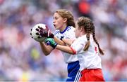 12 August 2018; Maeve Heenan, Kilbeheeny NS, Mitchelstown, Co Cork, representing Monaghan, and Katie Havern, Ballyholland PS, Newry, Co Down, representing Tyrone, during the INTO Cumann na mBunscol GAA Respect Exhibition Go Games at the GAA Football All-Ireland Senior Championship Semi Final match between Monaghan and Tyrone at Croke Park in Dublin.  Photo by Stephen McCarthy/Sportsfile