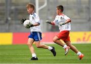 12 August 2018; Tommy Mallen, SN Iorball Sionnaigh, Scotstown, Co Monaghan in action against Jack McCabe, Sacred Heart, Sruleen, Co Dublin, representing Tyrone, during the INTO Cumann na mBunscol GAA Respect Exhibition Go Games at the GAA Football All-Ireland Senior Championship Semi Final match between Monaghan and Tyrone at Croke Park in Dublin.  Photo by Piaras Ó Mídheach/Sportsfile