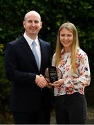 13 August 2018; Alan Smullen, General Manager, The Croke Park Hotel, presents Lynsey Noone of Galway with The Croke Park Hotel and LGFA Player of the Month award for July, at The Croke Park Hotel, Jones Road, in Dublin. Lynsey captained Galway to a first All-Ireland Minor A title since 2014 on 15 July at the Gaelic Grounds, Limerick. Lynsey was also named Player of the Match after producing a powerful performance for the winners against Cork. Photo by Ramsey Cardy/Sportsfile