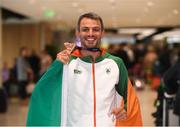 13 August 2018; Thomas Barr with his bronze medal at the Homecoming of the Irish Team from the European Athletics Championships in Berlin at Terminal 1 in Dublin Airport. Photo by Eóin Noonan/Sportsfile