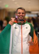 13 August 2018; Thomas Barr with his bronze medal at the Homecoming of the Irish Team from the European Athletics Championships in Berlin at Terminal 1 in Dublin Airport. Photo by Eóin Noonan/Sportsfile