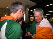 13 August 2018; Thomas Barr shows his bronze medal to his father Tommy at the Homecoming of the Irish Team from the European Athletics Championships in Berlin at Terminal 1 in Dublin Airport. Photo by Eóin Noonan/Sportsfile