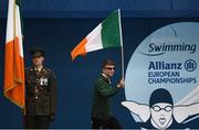 13 August 2018; Sean O’Riordan of Team Ireland carries the Irish tricolour at the start of the opening ceremony of the World Para Swimming Allianz European Championships at the Sport Ireland National Aquatic Centre in Blanchardstown, Dublin. Photo by Stephen McCarthy/Sportsfile