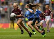 11 August 2018; Emer McEntee, Gowna NS, Gowna, Cavan, representing Galway, in action against Ruby O’Connell Bell, Our Lady of Good Counsel GNS, Dublin, during the INTO Cumann na mBunscol GAA Respect Exhibition Go Games at the GAA Football All-Ireland Senior Championship Semi Final match between Dublin and Galway at Croke Park in Dublin.  Photo by Piaras Ó Mídheach/Sportsfile