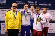 13 August 2018; Medallists in the Men's 50m Freestyle S11 Final, from left, silver medallist Viktor Smyrnov of Ukraine, gold medallist Hryhory Zudzilau of Hungary, and bronze medallist Wojciech Makowski of Poland, during day one of the World Para Swimming Allianz European Championships at the Sport Ireland National Aquatic Centre in Blanchardstown, Dublin. Photo by Stephen McCarthy/Sportsfile
