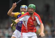 14 August 2018; Matthew O'Hanlon, Wexford hurler, representing Davy Russell’s Best, right, in action against Jackie Tyrrell, former Kilkenny hurler, representing Jim Bolger’s Stars, during the seventh annual Hurling for Cancer Research game, a celebrity hurling match in aid of the Irish Cancer Society at St Conleth’s Park, in Newbridge. The event, organised by legendary racehorse trainer Jim Bolger and National Hunt jockey Davy Russell, has raised €700,000 to date to fund the Irish Cancer Society’s innovative cancer research projects. Photo by Piaras Ó Mídheach/Sportsfile