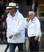 14 August 2018; Champion National Hunt trainer Willie Mullins, acting as umpire, attempts to call Hawk-Eye during the seventh annual Hurling for Cancer Research game, a celebrity hurling match in aid of the Irish Cancer Society at St Conleth’s Park, in Newbridge. The event, organised by legendary racehorse trainer Jim Bolger and National Hunt jockey Davy Russell, has raised €700,000 to date to fund the Irish Cancer Society’s innovative cancer research projects. Photo by Piaras Ó Mídheach/Sportsfile