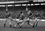 2 September 1973; Mick Crotty of Kilkenny, with team mate Jim Lynch, extreme right, has his shot blocked by Éamonn Cregan and Pat Hartigan of Limerick during the All Ireland Hurling Final match between Kilkenny and Limerick at Croke Park in Dublin. Photo by Connolly Collection/Sportsfile