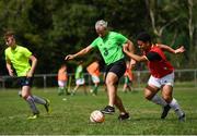 16 August 2018; Former Republic of Ireland international Stephen Hunt competes with Jonah Abode of Ballincollig AFC in a tournament hosted by Ballincollig AFC to honour the late Liam Miller during a FAI Festival of Football Club Visit to Ballincollig AFC in Cork. Photo by Stephen McCarthy/Sportsfile