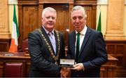 16 August 2018; Cllr. Mick Finn, Lord Mayor of Cork, makes a presentation to John Delaney, CEO, Football Association of Ireland,  at a reception hosted by the Lord Mayor of Cork for a FAI Delegation at City Hall in Cork. Photo by Stephen McCarthy/Sportsfile