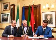16 August 2018; Republic of Ireland Women's National Team manager Colin Bell and Republic of Ireland manager Martin O'Neill sign the visitors book in the company of Cllr. Mick Finn, Lord Mayor of Cork, at a reception hosted by the Lord Mayor of Cork for a FAI Delegation at City Hall in Cork. Photo by Stephen McCarthy/Sportsfile