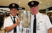 17 August 2018; First Officer Patrick Galliker, left, and Captain Don O'Sullivan, of Air Canada, with the Liam MacCarthy Cup at the GAA Fáilte Abhaile event at Dublin Airport in Dublin. Photo by Piaras Ó Mídheach/Sportsfile