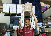 17 August 2018; Emma O'Connor, age 10, from Loughrea, Co Galway, with the Liam MacCarthy Cup at the GAA Fáilte Abhaile event at Dublin Airport in Dublin. Photo by Piaras Ó Mídheach/Sportsfile