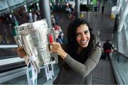 17 August 2018; Mary Saydein, from America, with the Liam MacCarthy Cup at the GAA Fáilte Abhaile event at Dublin Airport in Dublin. Photo by Piaras Ó Mídheach/Sportsfile