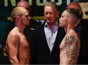 17 August 2018; Carl Frampton, right, and Luke Jackson face-off ahead of their bout for the interim WBO World Featherweight Title during the Windsor Park boxing weigh ins at Belfast City Hall in Belfast. Photo by Ramsey Cardy/Sportsfile