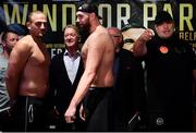 17 August 2018; Tyson Fury, centre, faces off with Francesco Pianeta ahead of their bout during the Windsor Park boxing weigh ins at Belfast City Hall in Belfast. Photo by Ramsey Cardy/Sportsfile