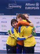 17 August 2018; Medallists in the Women's 200m Individual Medley SM11 event, from left, silver medallist Maryna Piddubna of Ukraine, gold medallist Liesette Bruinsma of Netherlands, and bronze medallist Yana Berezhna of Ukraine, embrace during day five of the World Para Swimming Allianz European Championships at the Sport Ireland National Aquatic Centre in Blanchardstown, Dublin. Photo by David Fitzgerald/Sportsfile