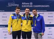 17 August 2018; Medallists in the Men's 100m Butterfly S10 Final event, from left, silver medallist Maksym Krypak of Ukraine, gold medallist Denys Dubrov of Ukraine, and bronze medallist Stefano Raimondi of Italy, during day five of the World Para Swimming Allianz European Championships at the Sport Ireland National Aquatic Centre in Blanchardstown, Dublin. Photo by David Fitzgerald/Sportsfile