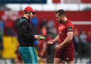 17 August 2018; JJ Hanrahan of Munster is handed his kicking tee by team-mate Tyler Bleyendaal during the Keary's Renault pre-season friendly match between Munster and London Irish at Irish Independent Park in Cork. Photo by Diarmuid Greene/Sportsfile