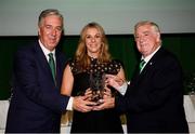 17 August 2018; Journalist Marie Crowe is presented with her award for Best Feature by John Delaney, CEO, Football Association of Ireland, left, and FAI President Tony Fitzgerald, right, during the FAI Communications Awards at the Rochestown Park Hotel in Cork. Photo by Stephen McCarthy/Sportsfile