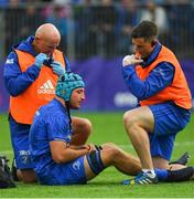 17 August 2018; Will Connors of Leinster is treated for an injury by Leinster team doctor Dr. Jim McShane, left, and academy physiotherapist Darragh Curley during the Bank of Ireland Pre-season Friendly match between Leinster and Newcastle Falcons at Energia Park in Dublin. Photo by Ramsey Cardy/Sportsfile