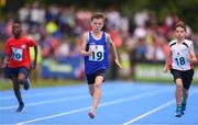 18 August 2018; Cormac Crotty of St Patricks, Co. Cavan, centre, competing in the U12 Boys 100m event during day one of the Aldi Community Games August Festival at the University of Limerick in Limerick. Photo by Sam Barnes/Sportsfile