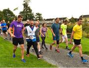 18 August 2018; Vhi ambassador and Olympian David Gillick and race director Kevin Cane lead participants to the start line at the Longford parkrun where Vhi hosted a special event to celebrate their partnership with parkrun Ireland. David was on hand to lead the warm up for parkrun participants before completing the 5km free event. Parkrunners enjoyed refreshments post event at the Vhi Relaxation Area where a physiotherapist took participants through a post event stretching routine.   parkrun in partnership with Vhi support local communities in organising free, weekly, timed 5k runs every Saturday at 9.30am.To register for a parkrun near you visit www.parkrun.ie. Photo by Seb Daly/Sportsfile