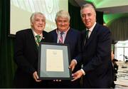 18 August 2018; FAI President Tony Fitzgerald, left, and John Delaney, CEO, Football Association of Ireland, right, make a presentation to newly elected FAI Honorary Life President Denis O'Brien during the Football Association of Ireland Annual General Meeting at the Rochestown Park Hotel in Cork. Photo by Stephen McCarthy/Sportsfile