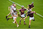 18 August 2018; Philip Mullaney of Dicksboro, Co Kilkenny in action against Éanna and Matthew Cox of Clarinbridge, Co Galway, competing in the Hurling U11 event during day one of the Aldi Community Games August Festival at the University of Limerick in Limerick. Photo by Harry Murphy/Sportsfile