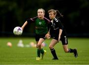 18 August 2018; Roísín O'Donovan of Kiltoom-Cam, Co Roscommon, in action against Clodagh Heron of Fanad, Co Donegal, competing in the Soccer 7 a side U12 event during day one of the Aldi Community Games August Festival at the University of Limerick in Limerick. Photo by Harry Murphy/Sportsfile