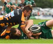 18 August 2018; Matt Healy of Connacht is tackled by Ambrose Curtis and Rob Miller of Wasps on his way to scoring his side's second try during the Pre-season Friendly match between Connacht and Wasps at Dubarry Park in Westmeath. Photo by Seb Daly/Sportsfile