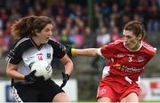 18 August 2018; Katie Walsh of Sligo in action against Joanne Barrett of Tyrone during the 2018 TG4 All-Ireland Ladies Intermediate Football Championship semi-final match between Sligo and Tyrone at Fr. Tierney Park in Donegal. Photo by Oliver McVeigh/Sportsfile