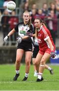 18 August 2018; Denise McGrath of Sligo in action against Slaine O'Carroll of Tyrone during the 2018 TG4 All-Ireland Ladies Intermediate Football Championship semi-final match between Sligo and Tyrone at Fr. Tierney Park in Donegal. Photo by Oliver McVeigh/Sportsfile